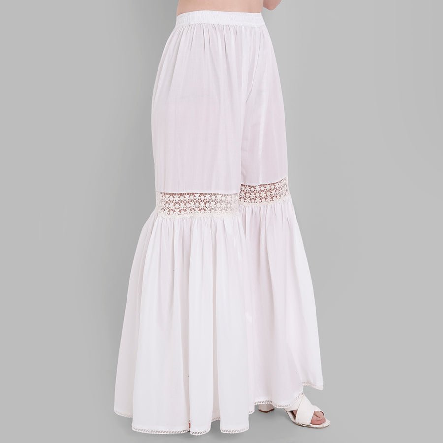 Pure cotton Hakoba fabric off white short kurti with a mirror work  neckline, paired with matching